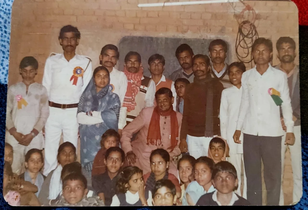 Archival group photograph with children and adults